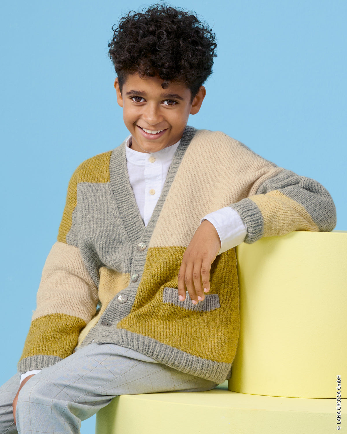Lana Grossa Kids Nr. 15 model 18 - vest met Cool Merino - sfeerfoto 1